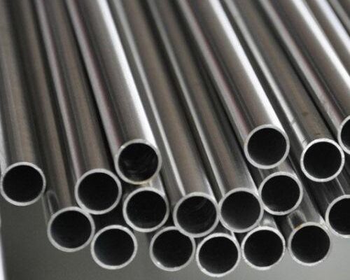 Metal pipes stacked, industrial material.
